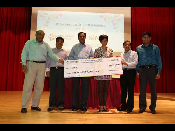 Mr Atul Temurnikar and Mr T Raja Segar; (Standing L to R) Mr Subodh Gore, Mr Chandu Borde, Ms Indranee Rajah and Mr Kaustubh Bodhankar